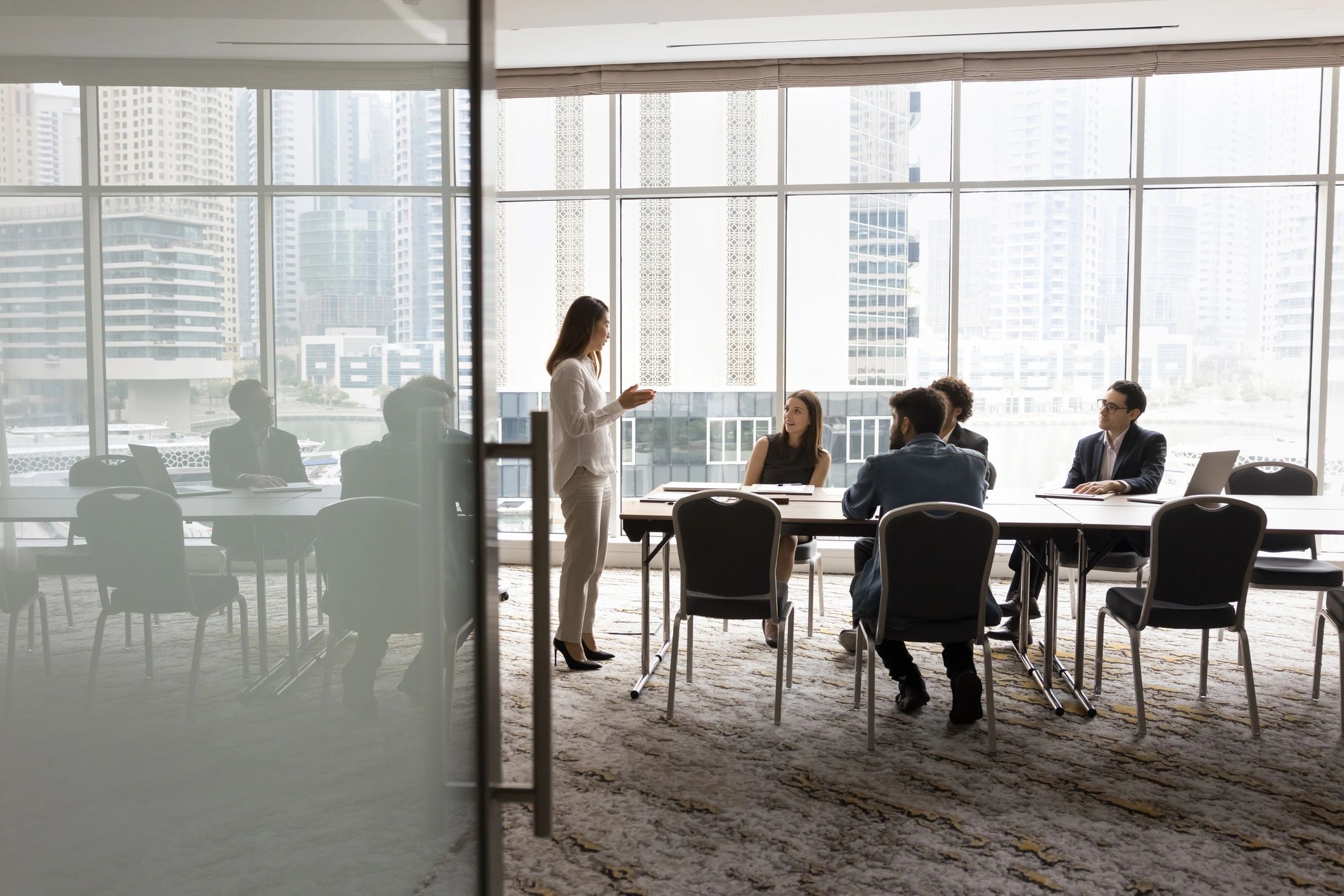 Business team discussing AI strategy in a meeting