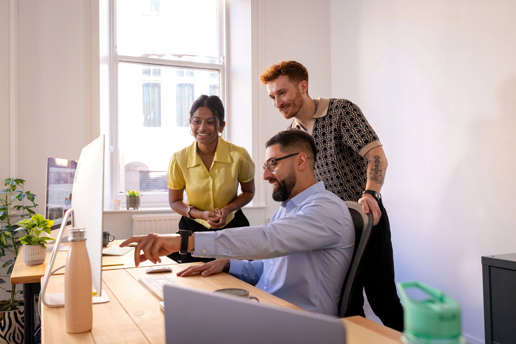 Customer support team reviewing service workflows
