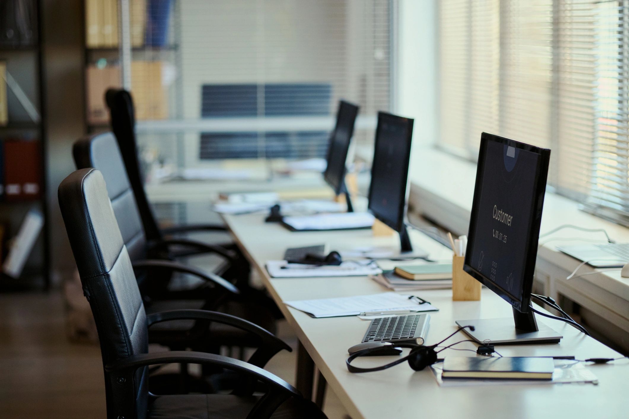 Customer support workstations in a professional office environment
